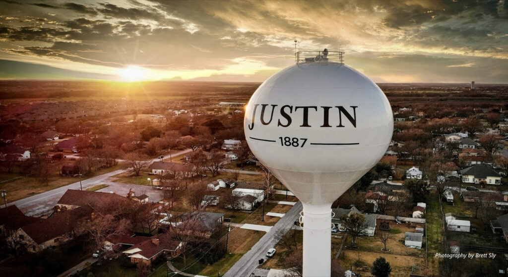 Justin, Texas water tower at sunset